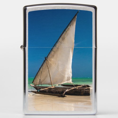 Traditional fishing boat on the beach zippo lighter