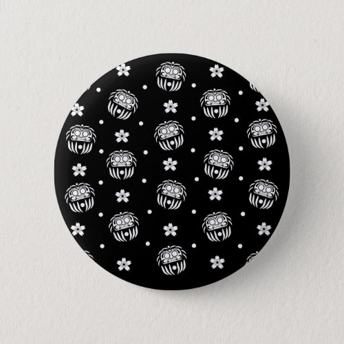 Traditional japanese daruma doll black and white button