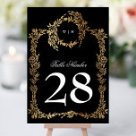 Traditional Monogram Black Crest Classic Wedding Table Number<br><div class="desc">onyx tuxedo black traditional Monogram Crest Classic Elegant Wedding _____________________________ ***this design is part of a collection*** Experience the charm of timeless elegance with my formal Traditional Monogram Wreath Classic and Elegant Wedding Collection. This collection features personalized monogrammed designs with an intricately woven wreath and frame, encapsulating the essence of...</div>