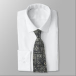 Traditional Polynesian Tapa Cloth Pattern Neck Tie<br><div class="desc">Wear this bit of Polynesian history in black, greys, and cream. Tapa cloth (called Kapa in Hawaii) is a barkcloth, decorated with geometric grids and repeating motifs, which was originally worn as clothing and/or as adornment for ceremonial items. The intricate geometric patterns of this tie combined with the subtle color...</div>
