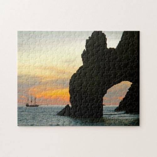 Traditional Sailboat At SunsetCabo Rock Arches Jigsaw Puzzle