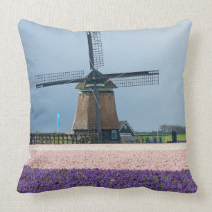 Traditional windmill with pink and purple flowers throw pillow