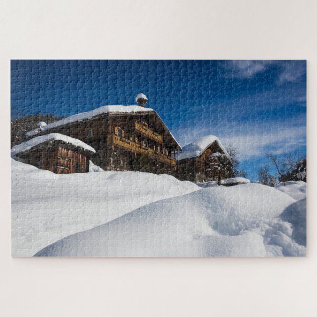 Traditional wooden cabins in de snow jigsaw puzzle (Horizontal)