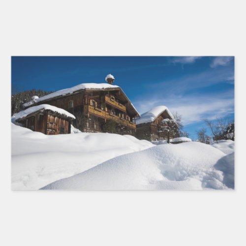 Traditional wooden cabins in de snow rectangular sticker