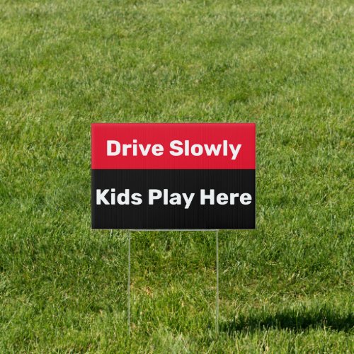 Traffic Safety  Drive Slowly Kids Play Here Sign