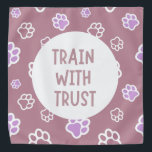 Train with Trust Pet Bandana<br><div class="desc">Confidence Starts with Comfort. Elevate your training sessions with the Train with Trust Pet Bandana — the perfect blend of style, comfort, and communication. Designed for pet parents and professional trainers alike, this bandana sends a clear, friendly message: "We're learning, please be kind." Made from soft, breathable fabric with a...</div>