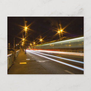Tram crossing the bridge postcard