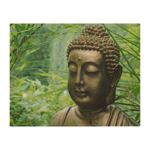 Tranquil Buddha Statue in a Leafy Green Forest Wood Wall Decor