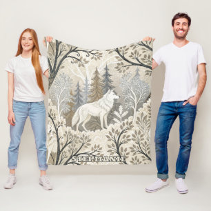 Tranquil Winter Forest Scene with White Wolves Fleece Blanket