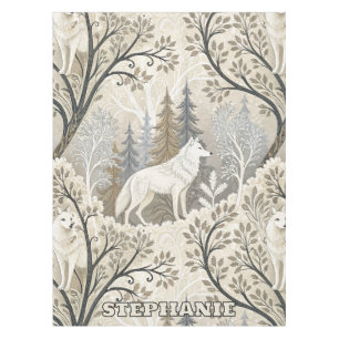 Tranquil Winter Forest Scene with White Wolves Tablecloth