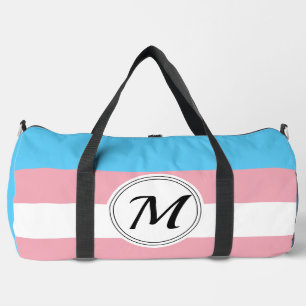 Transgender pride flag with a custom initial duffle bag