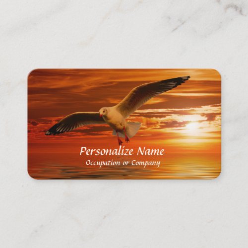 Traveling Seagull Flying over the Ocean at Sunset Business Card