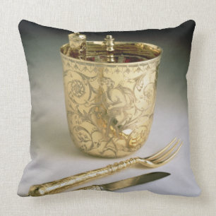 Travelling set of a knife, fork, spoon and beaker, throw pillow