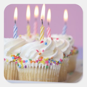 Tray Of Birthday Cupcakes With Candles Square Sticker by prophoto at Zazzle
