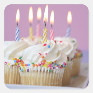 Tray of birthday cupcakes with candles square sticker