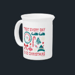 Treat Every Day Like Christmas Beverage Pitcher<br><div class="desc">This festive Elf design features holiday ornaments,  candy,  Spirit Clausometer,  and Buddy's hat and shoes! Wear this on a cozy sweater,  send warm greetings with a card,  or carry on a shopping tote. Shop this design on even more custom Zazzle gifts!</div>