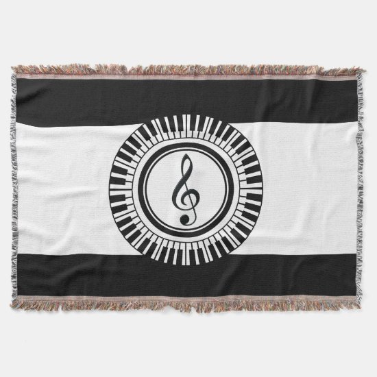 Treble clef in piano keys throw blanket
