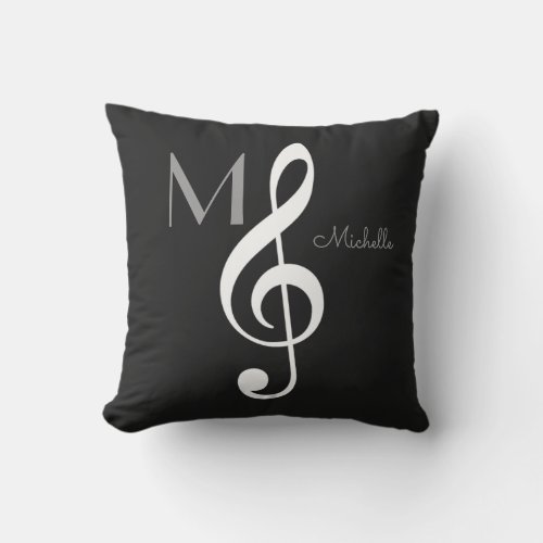 treble clef music note monogram black throw pillow