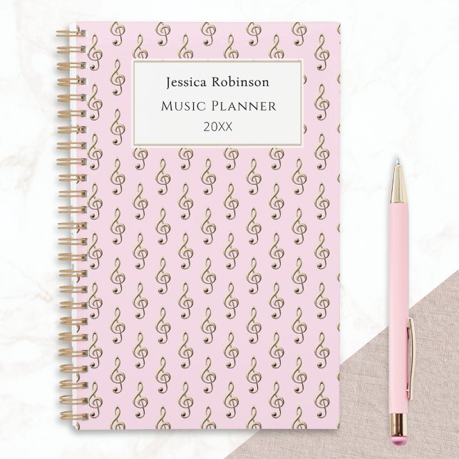 Treble Clef Pattern Elegant Pink Music Themed Planner (A pink planner with faux gold treble clefs pattern, personalized with name, planner title and year)