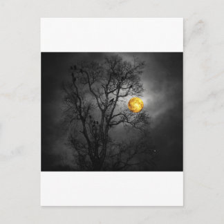 Tree full of ravens with a full moon. postcard