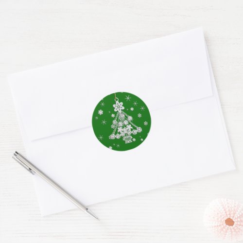 Tree Ornament and Snowflakes Over Green Classic Round Sticker