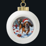 Treeing Walker Coonhound Snow with Christmas Hat Ceramic Ball Christmas Ornament<br><div class="desc">A spirited Treeing Walker Coonhound runs happily through the snowy winter scene,  wearing a festive red Christmas hat. This lively design highlights the breed’s sleek coat,  athletic build,  and determined personality while capturing the warmth and joy of the holiday season. A heartwarming winter moment full of festive cheer.</div>