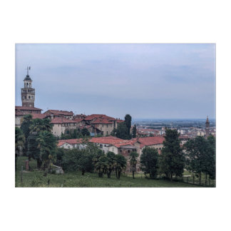 Trees and buildings in city against sky acrylic print