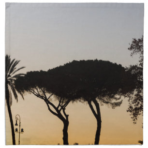Trees at sunset in backlight in Rome Cloth Napkin