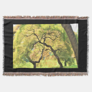 trees in black throw blanket