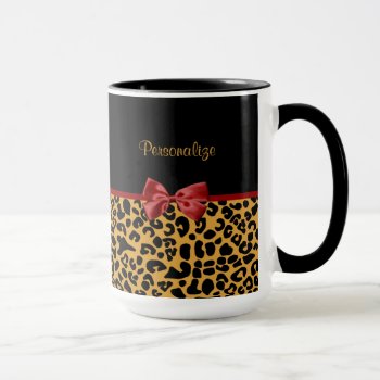 Trendy Black And Gold Leopard Print Red Ribbon Bow Mug by PhotographyTKDesigns at Zazzle