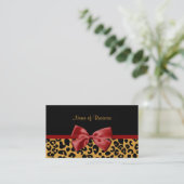 Trendy Black And Gold Leopard Print Red Ribbon Business Card (Standing Front)