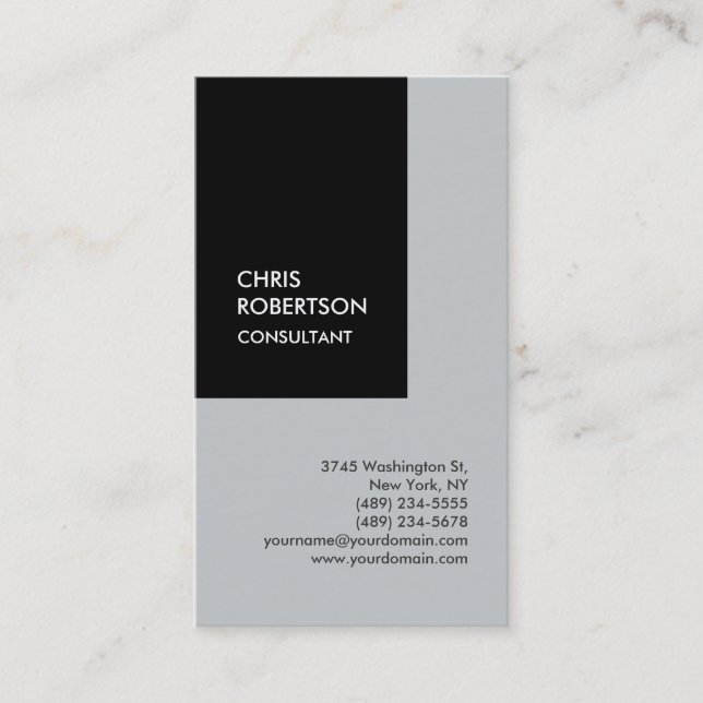 Trendy black grey vertical unique business card (Front)