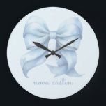 Trendy Blue Bow Personalized With Name Monogram Large Clock<br><div class="desc">Elevate your home or office decor with the Trendy Blue Bow Personalized With Name Monogram Large Clock, a perfect fusion of style and function. The clock’s preppy coquette bow, rendered in soft watercolor hues, brings a vintage girly aesthetic to any space. Whether you’re decorating a grandmillennial-themed room or adding a...</div>