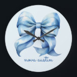 Trendy Blue Bow Personalized With Name Monogram Large Clock<br><div class="desc">Bring a blend of elegance and charm into your space with the Trendy Blue Bow Personalized With Name Monogram Large Clock. This beautifully crafted timepiece features a delicate watercolor bow, capturing a preppy coquette aesthetic that’s both trendy and timeless. The custom name monogram adds a personal touch, making it a...</div>