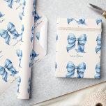 Trendy Blue Bow Personalized With Name Monogram Wrapping Paper<br><div class="desc">Transform your gift-giving into a stylish affair with our Trendy Blue Bow Personalized With Name Monogram Wrapping Paper. This elegant wrapping paper features a chic preppy blue coquette bow, perfectly capturing the trendy coquette aesthetic that’s all the rage. Designed with a watercolor bow motif, this wrapping paper not only adds...</div>
