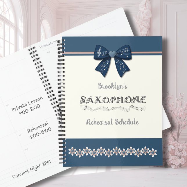 Trendy Blue Coquette Bow Saxophone Music Planner (Trendy navy blue coquette bow saxophone planner for teen girls to track practice and concert dates.)