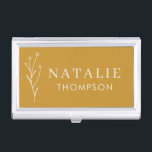 Trendy Boho Chic Minimalist Mustard Yellow Custom Business Card Case<br><div class="desc">Our Trendy Boho Chic Minimalist Mustard Yellow Custom Business Card Case, the perfect accessory for the modern professional. Designed with elegance and sophistication in mind, this business card case features a chic mustard yellow exterior adorned with a delicate flower drawing. The minimalist design, complemented by trendy typography, ensures a sleek...</div>
