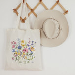 Trendy Colorful Wildflowers with Monogram Tote Bag<br><div class="desc">This stylish tote features a bouquet of pretty boho wildflowers,  in shades of blue,  purple,  pink,  and yellow with lovely green leaves. Add your monogram or initials at the bottom. The perfect wedding party gift or keepsake,  especially for your maid of honor or flower girl.</div>