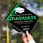 Trendy Masculine Graduate for Him Graduation Cap T<br><div class="desc">Modern graduation cap topper for him featuring a stylish black background that can be changed to any color,  a graduate cap,  2 cool green stripes,  the saying "the tassel was worth the hassle",  the students name,  the high school/college,  and class year.</div>