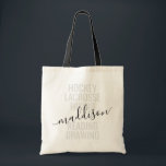 Trendy Monogram Name Script Sport and Hobby Tote Bag<br><div class="desc">Personalized Custom Monogram Name Tote Bag with editable text and wording for a list of her sports and favorite hobbies makes a fun and useful gift for the girl always on the go and in lots of extracurricular activities. This example reads "hockey, lacrosse, hiking, reading, drawing" but the text can...</div>
