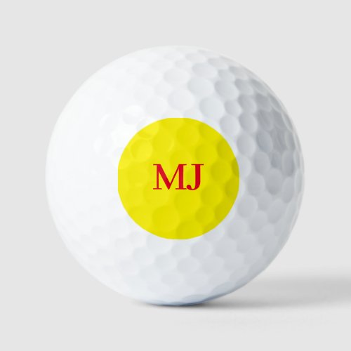 Trendy plain simple yellow red monogram initials golf balls