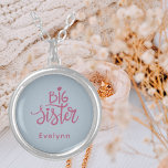 Trendy Stylish "Big Sister" Pink & Silver Monogram Silver Plated Necklace<br><div class="desc">Advertise the big sister in your life or "big sister to be" with this aesthetic and modern necklace. A pretty berry pink script on a silver background. A perfect gift for a girl about to become a sister or a sister who has already fulfilled this role for a long time!...</div>