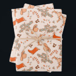 Trendy Western Cowboy Aesthetic Christmas Pattern Wrapping Paper Sheets<br><div class="desc">Add a rustic twist to your holiday gift-giving with these Trendy Western Cowboy Aesthetic Christmas Pattern Wrapping Paper Sheets. Featuring a unique design that blends classic Christmas elements with a stylish Western cowboy theme, this wrapping paper is perfect for those who love a bit of country flair. The pattern showcases...</div>