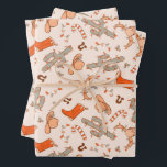 Trendy Western Cowboy Aesthetic Christmas Pattern Wrapping Paper Sheets<br><div class="desc">Add a rustic twist to your holiday gift-giving with these Trendy Western Cowboy Aesthetic Christmas Pattern Wrapping Paper Sheets. Featuring a unique design that blends classic Christmas elements with a stylish Western cowboy theme, this wrapping paper is perfect for those who love a bit of country flair. The pattern showcases...</div>