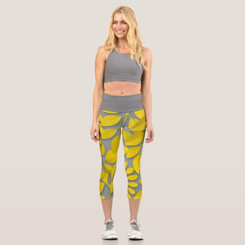 trendy yellow leaf capri leggings