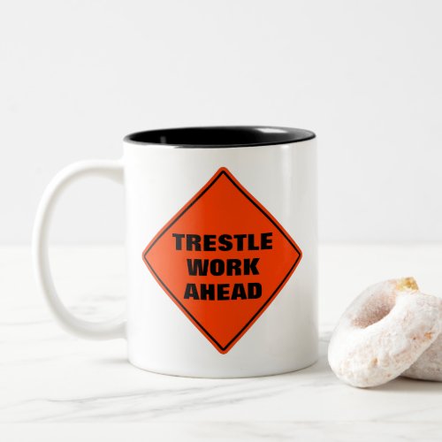 Trestle work ahead funny orange caution road sign Two_Tone coffee mug