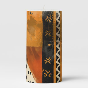 Tribal motifs in black and earth tones pillar candle