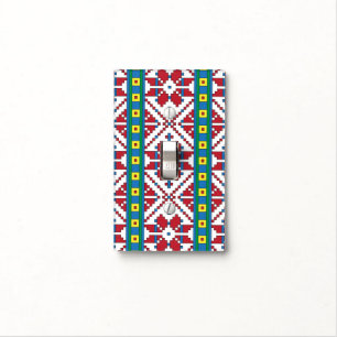 Tribal red, blue, and white star geometric pattern light switch cover