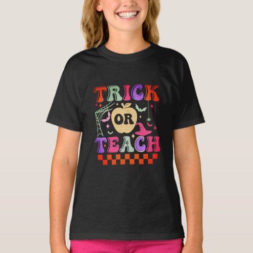 Trick Or Teach Teacher Groovy Retro Halloween T_Shirt