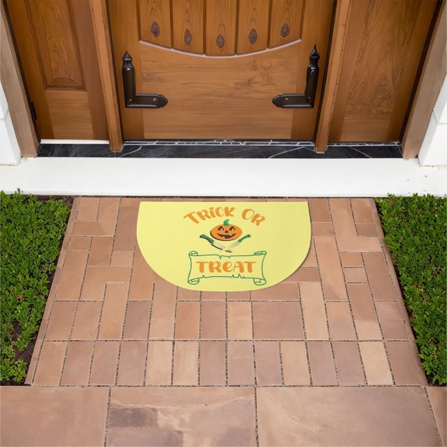Trick or treat crossbones Halloween pumpkin face Doormat (Outdoor)